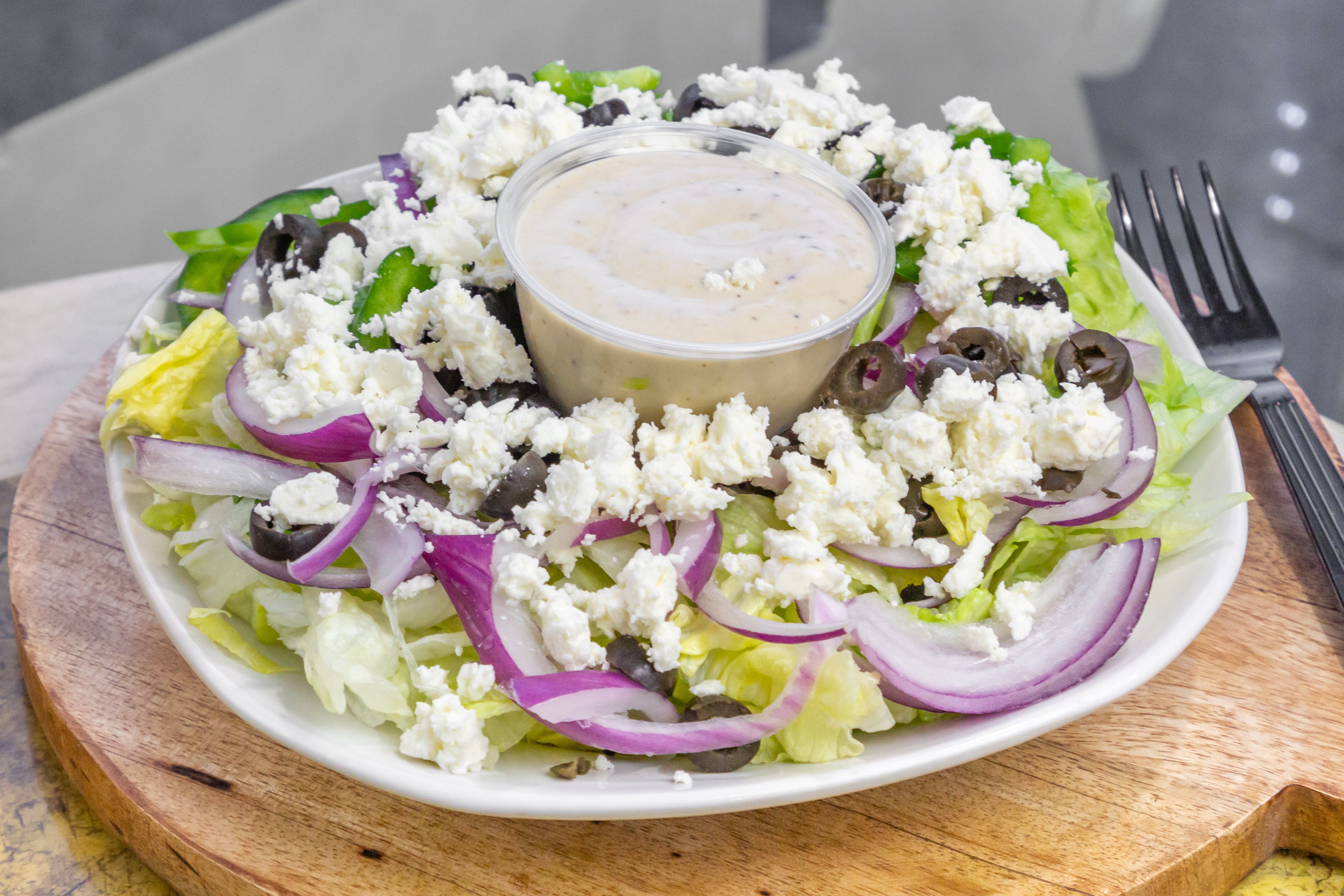 Order Greek Salad - Large food online from Cafe Lark store, Albany on bringmethat.com