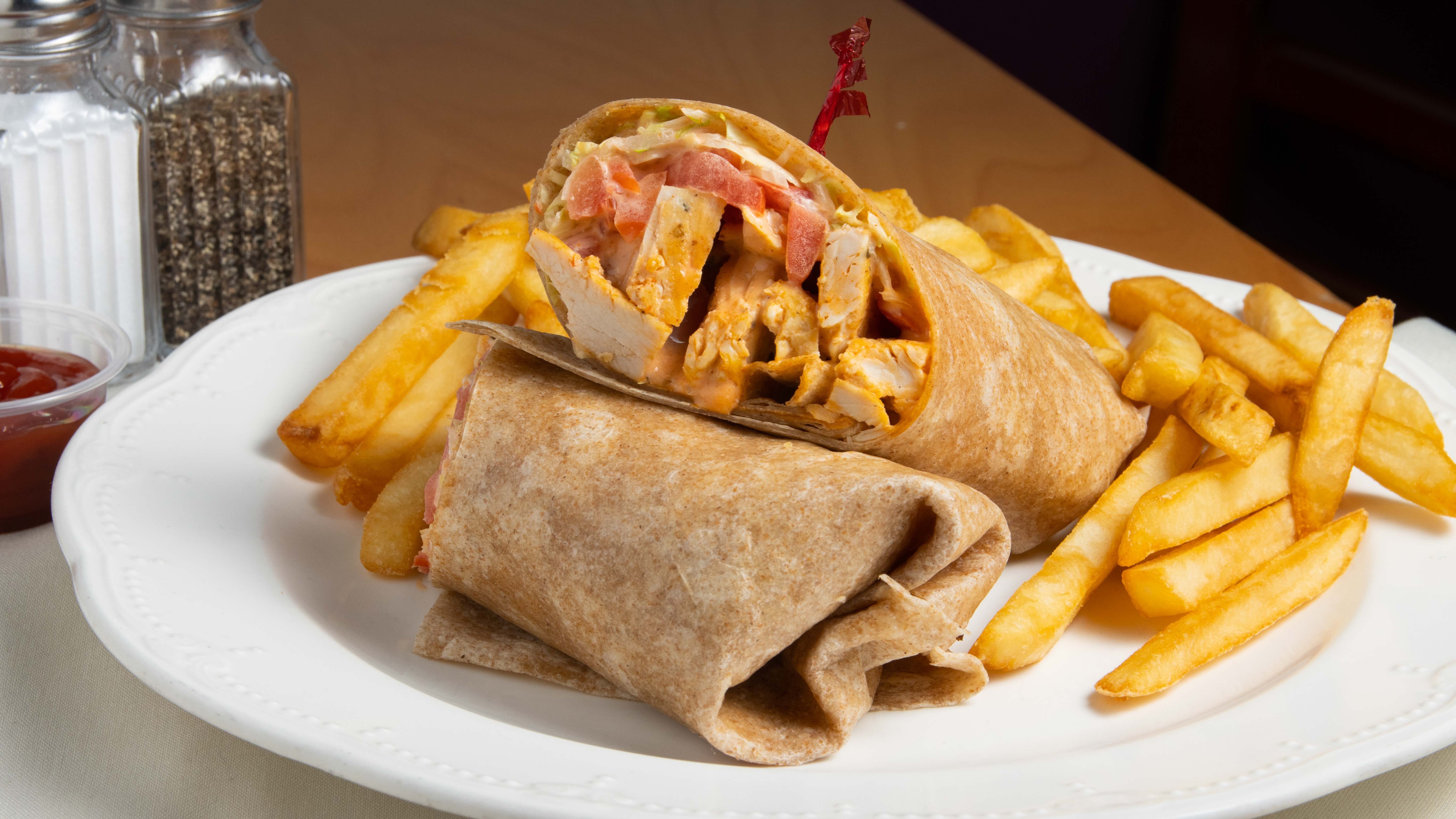 Order Chicken Caesar Wrap - Wrap food online from Lazio Pizza store, East Hanover on bringmethat.com