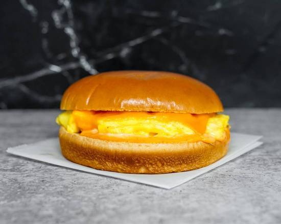 Order Brioche/Croissant, Egg, & Cheddar  food online from Breakfast in Bed store, Troy on bringmethat.com