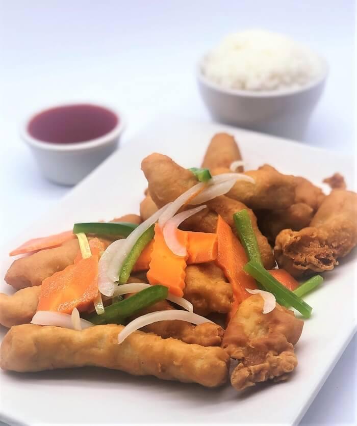 Order SWEET & SOUR CHICKEN food online from Kim Son Cafe  store, Houston on bringmethat.com