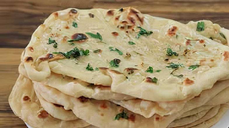 Order Garlic Naan food online from Tandoori & Curry store, Fremont on bringmethat.com