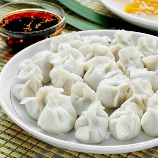 Order Steamed Pork Dumplings水饺 food online from Chuanyu Fusion store, Oklahoma City on bringmethat.com