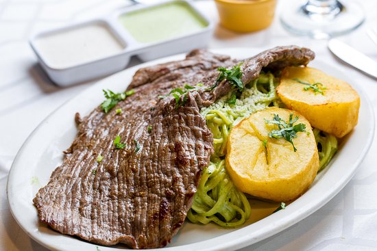 Order Tallarin Verde con Bistec food online from Valentino's store, Bay Shore on bringmethat.com