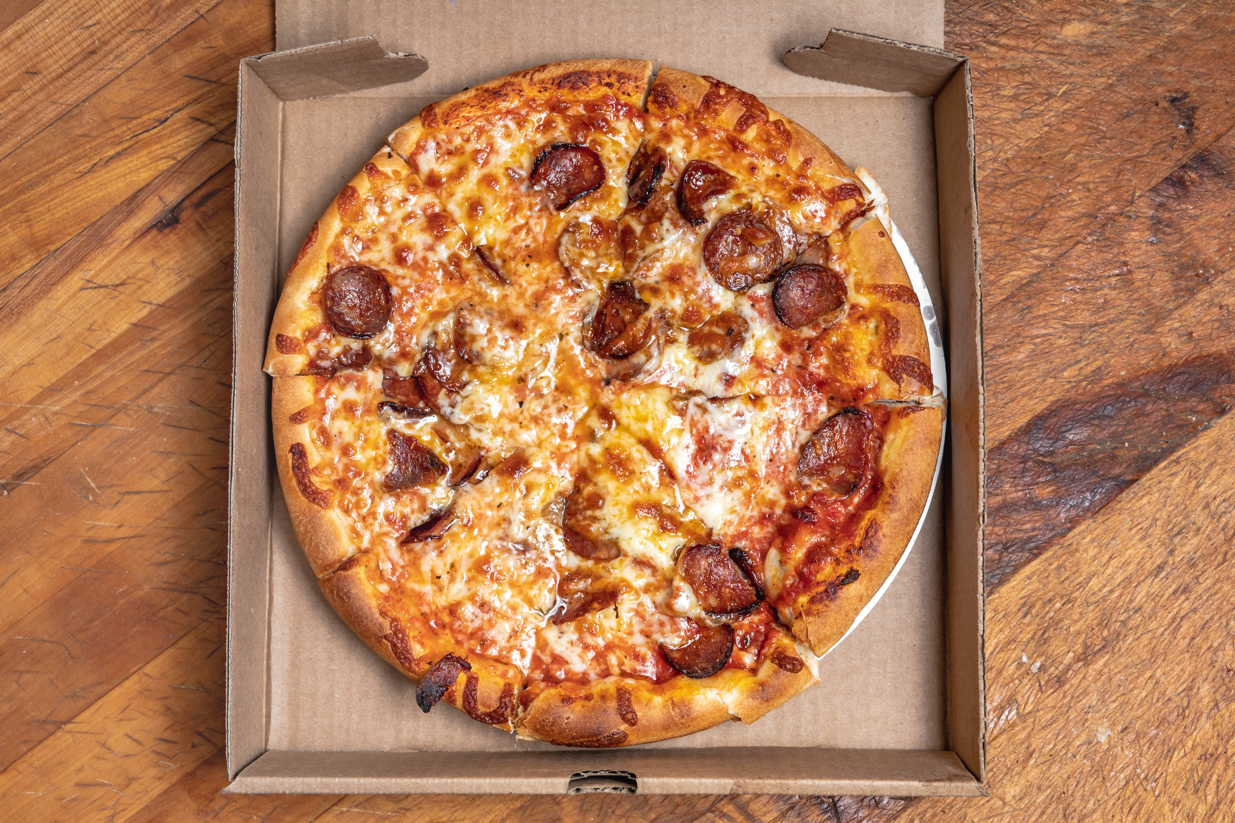 Order Spicy Italian Sausage Pizza - Small 10'' food online from Garden Pizza store, Milford on bringmethat.com