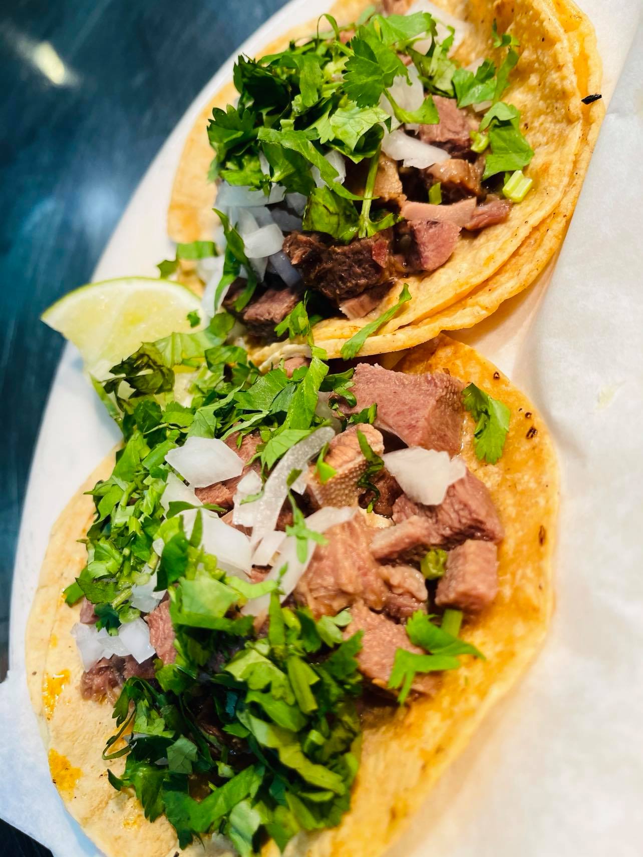 Order Tacos  food online from Antojitos De Dona Maria store, Summit on bringmethat.com