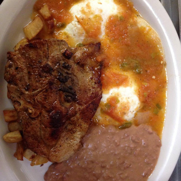 Order Huevos Rancheros with Pork Chop food online from Morales Mexican Restaurant store, Houston on bringmethat.com