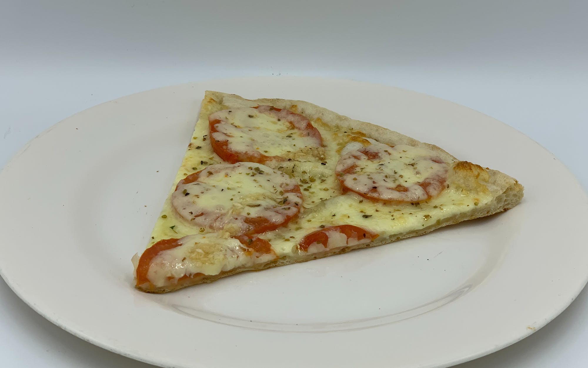 Order Tomato & Garlic Pizza - Personal food online from Mario Pizza store, Westbury on bringmethat.com
