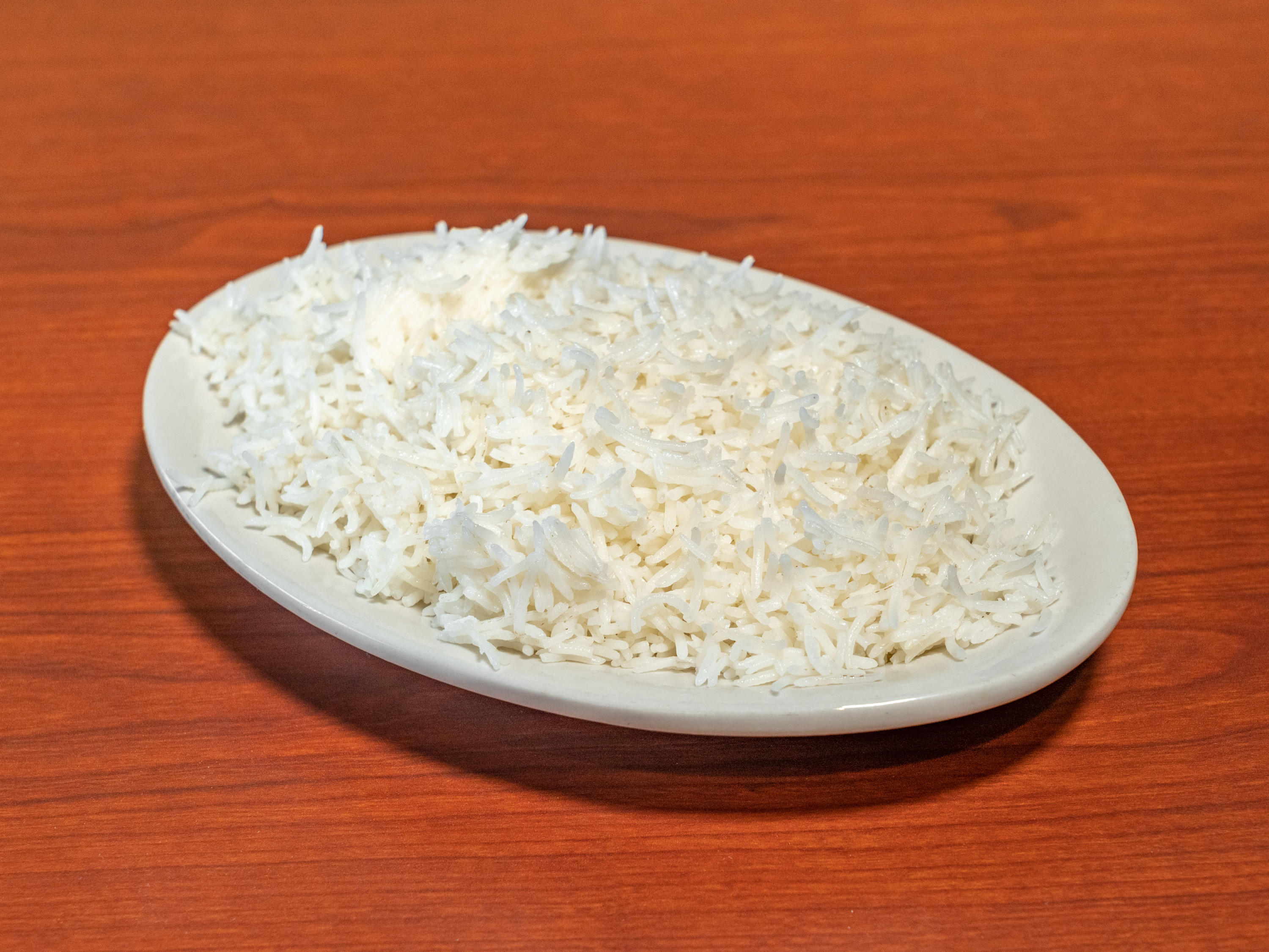 Order Plain Rice food online from New Delhi Restaurant store, Sterling Heights on bringmethat.com