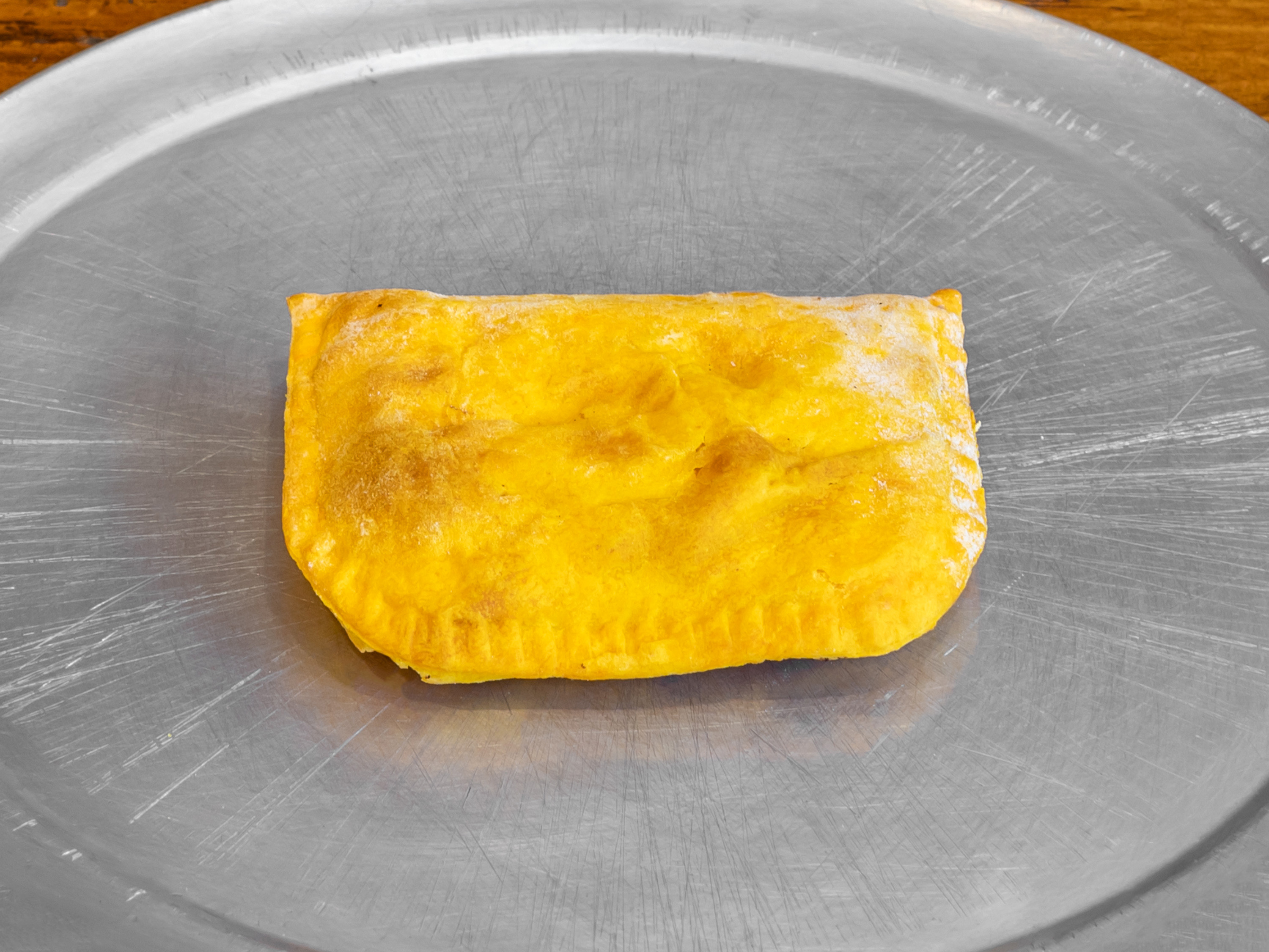 Order Jamaican Beef Patty food online from Brick Oven Pizza store, Dobbs Ferry on bringmethat.com