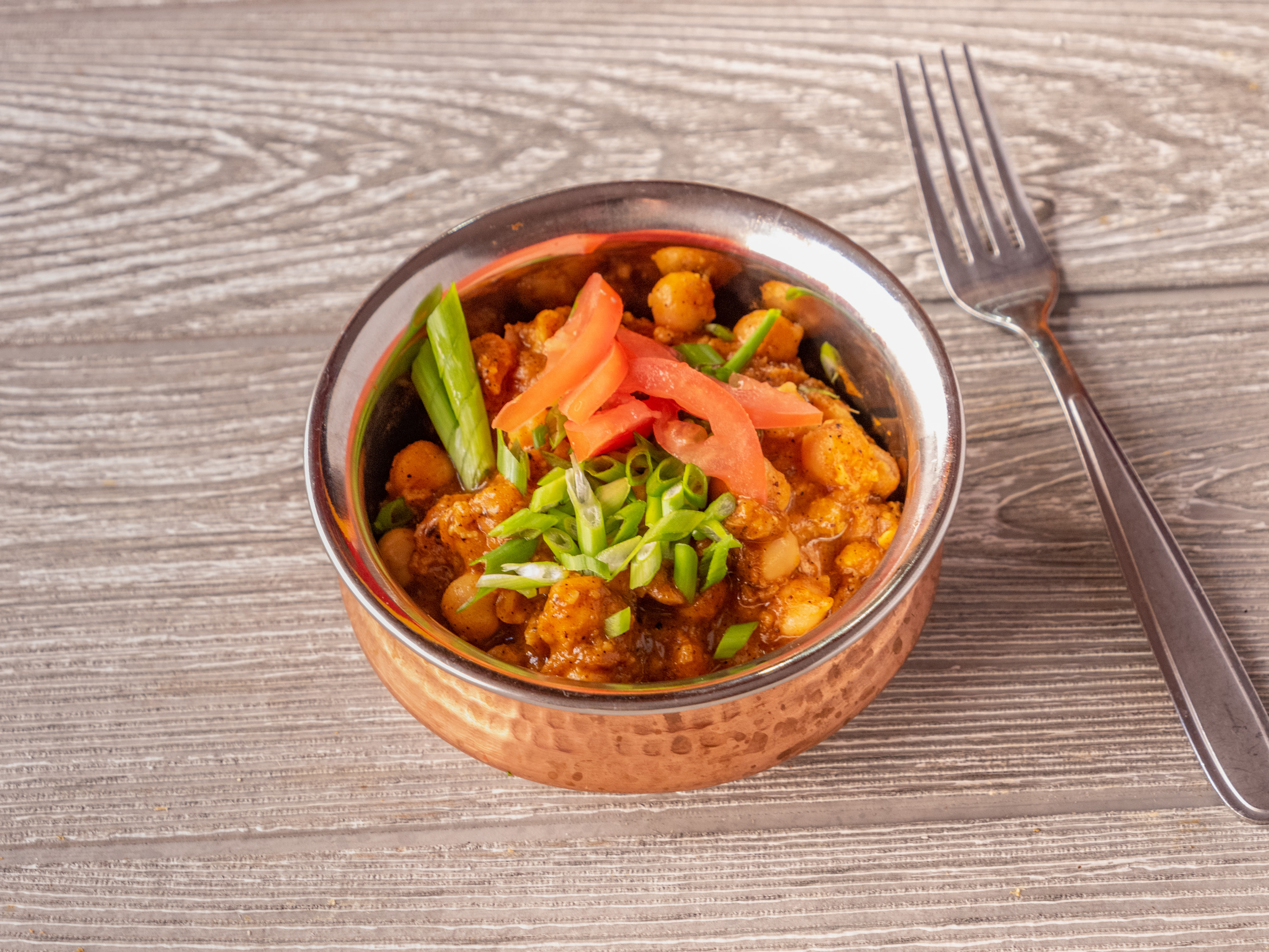 Order Chana Masala food online from Indian Kitchen Lovash store, Philadelphia on bringmethat.com