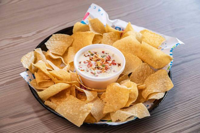 Order Loaded Queso food online from Ted Tacos & Cantina store, Ardmore on bringmethat.com
