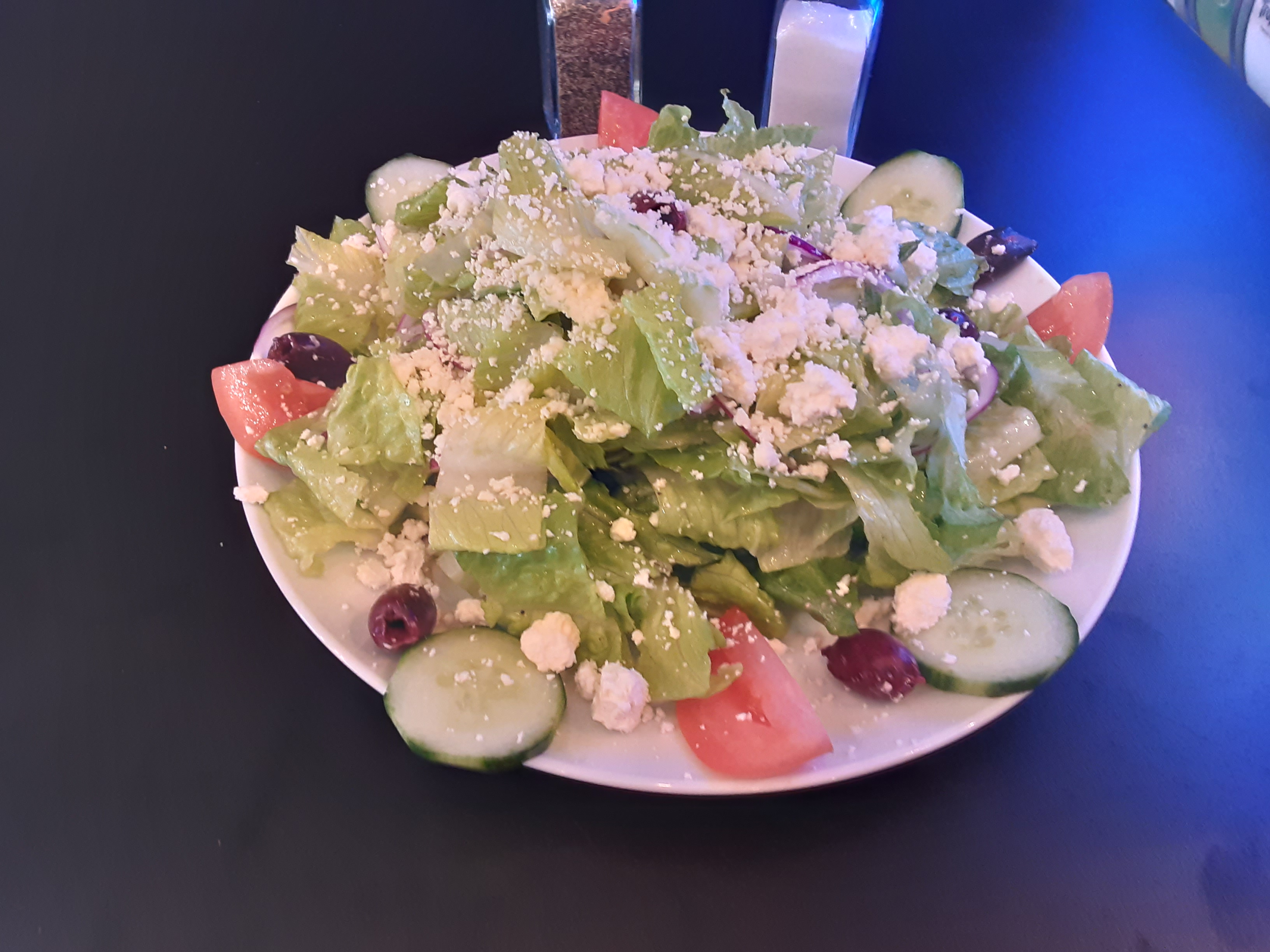 Order Greek Salad food online from Flippers Gourmet Burgers store, San Francisco on bringmethat.com