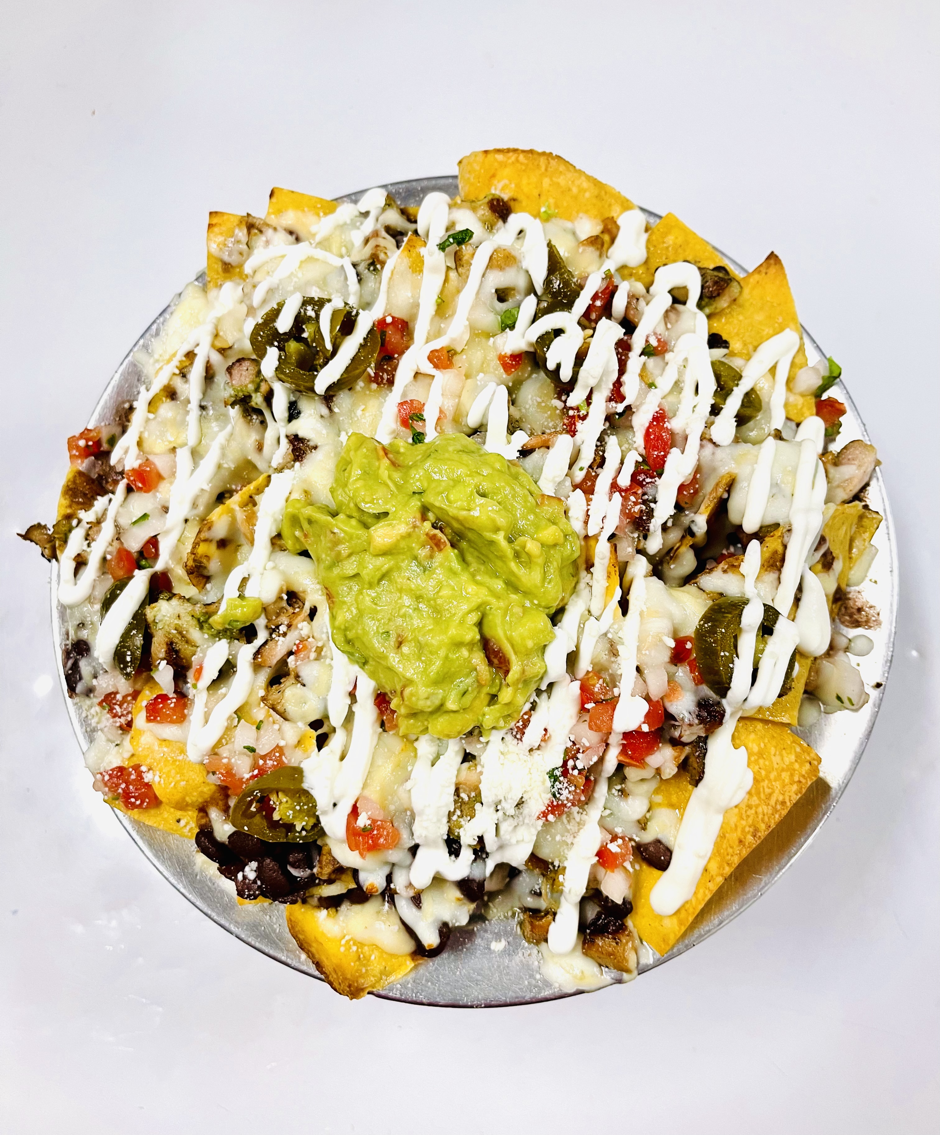 Order Super nachos food online from Don pancho villa restaurant store, Brooklyn on bringmethat.com