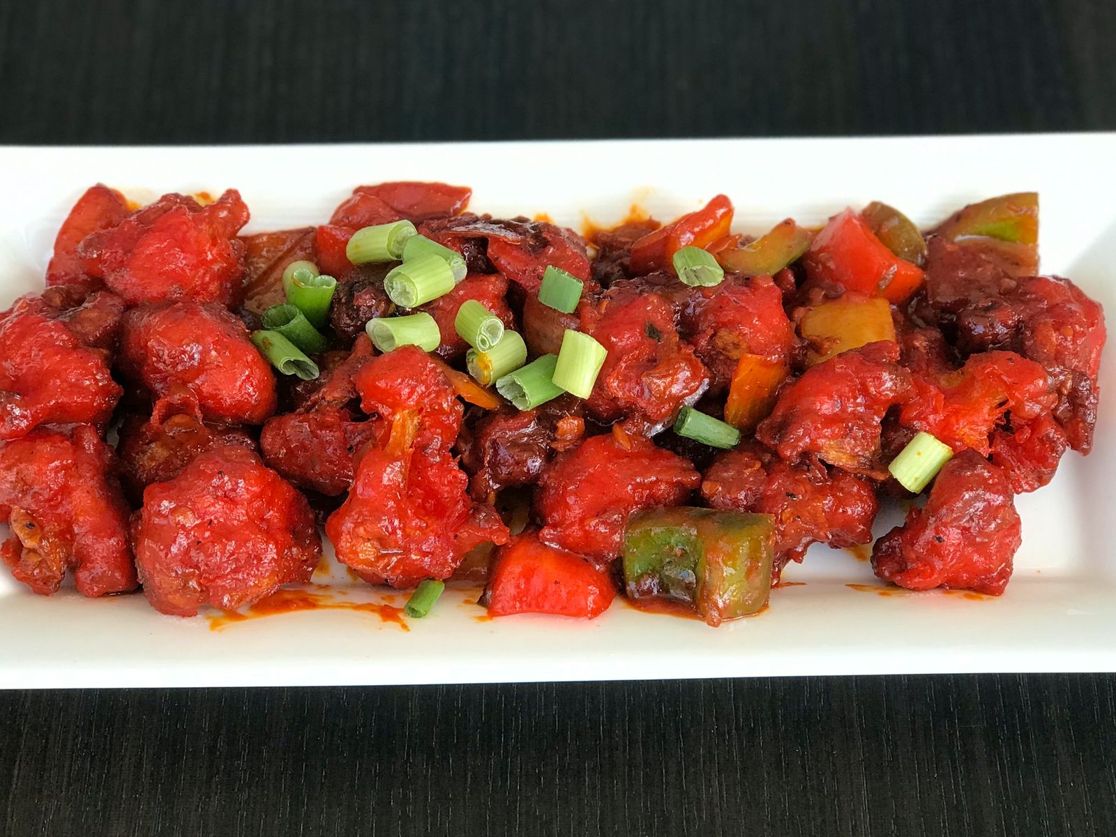 Order Chilli Gobi food online from Mirchi Indian Kitchen store, Foster City on bringmethat.com