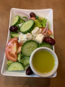 Order Small Greek Salad food online from Olive Tree Cafe store, Newark on bringmethat.com