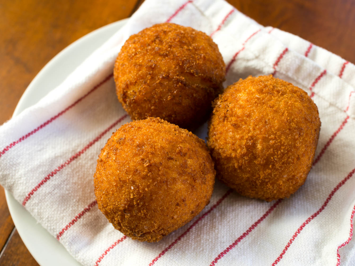 Order 4 Pieces Small Rice Balls food online from Bella Italia Pork Store & Catering store, Monroe Township on bringmethat.com