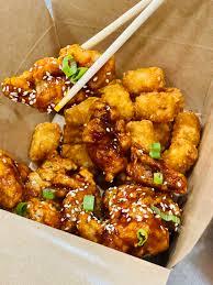 Order Loaded Tots & Popcorn Chicken (Popular Seller) food online from Coconut Girl Kitchen store, San Diego on bringmethat.com