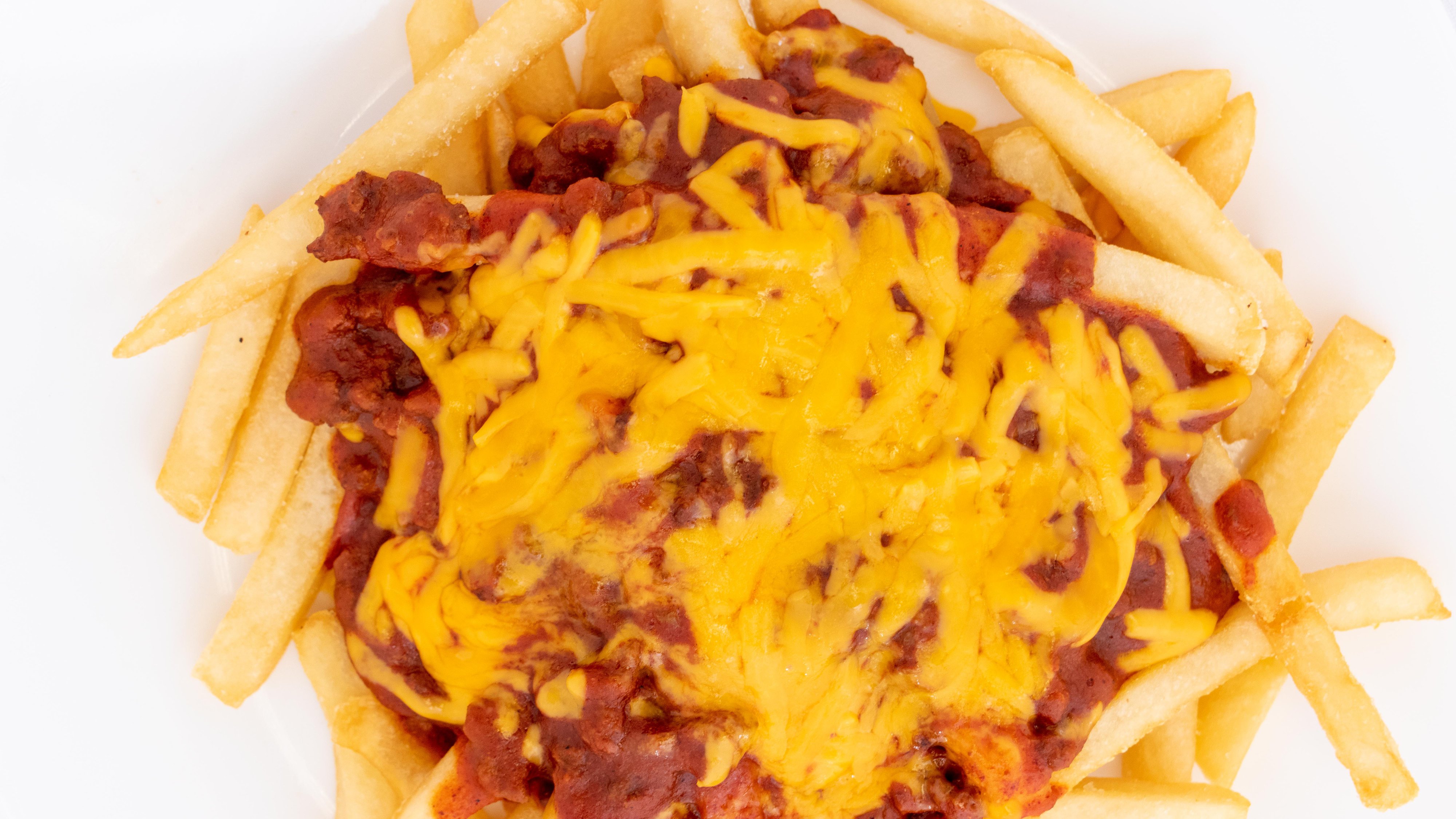 Order ----- CHILI CHZ FRIES food online from Bad Boy Burgers store, Boise on bringmethat.com