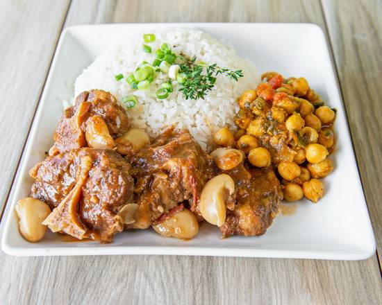 Order Oxtail food online from M&J Caribbean Cuisine store, Peachtree Corners on bringmethat.com