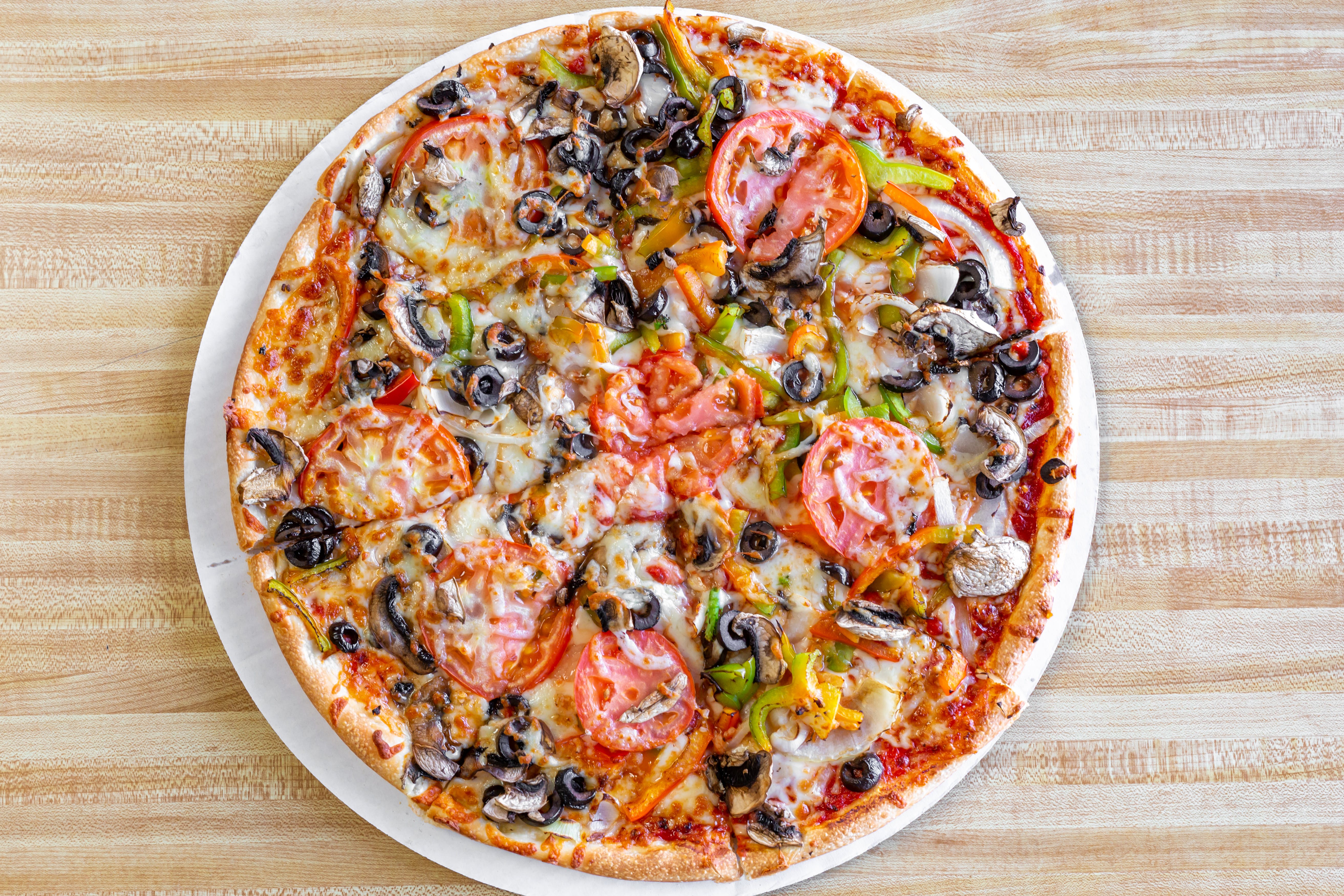 Order Veggie Pizza - Small food online from Pizza World store, Salem on bringmethat.com