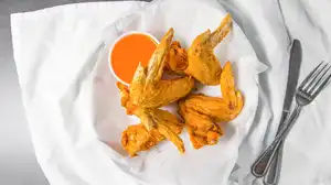 Order 4 Piece Whole Jumbo Chicken Wings with 1 Sauce food online from Marino Eatery store, Greensburg on bringmethat.com