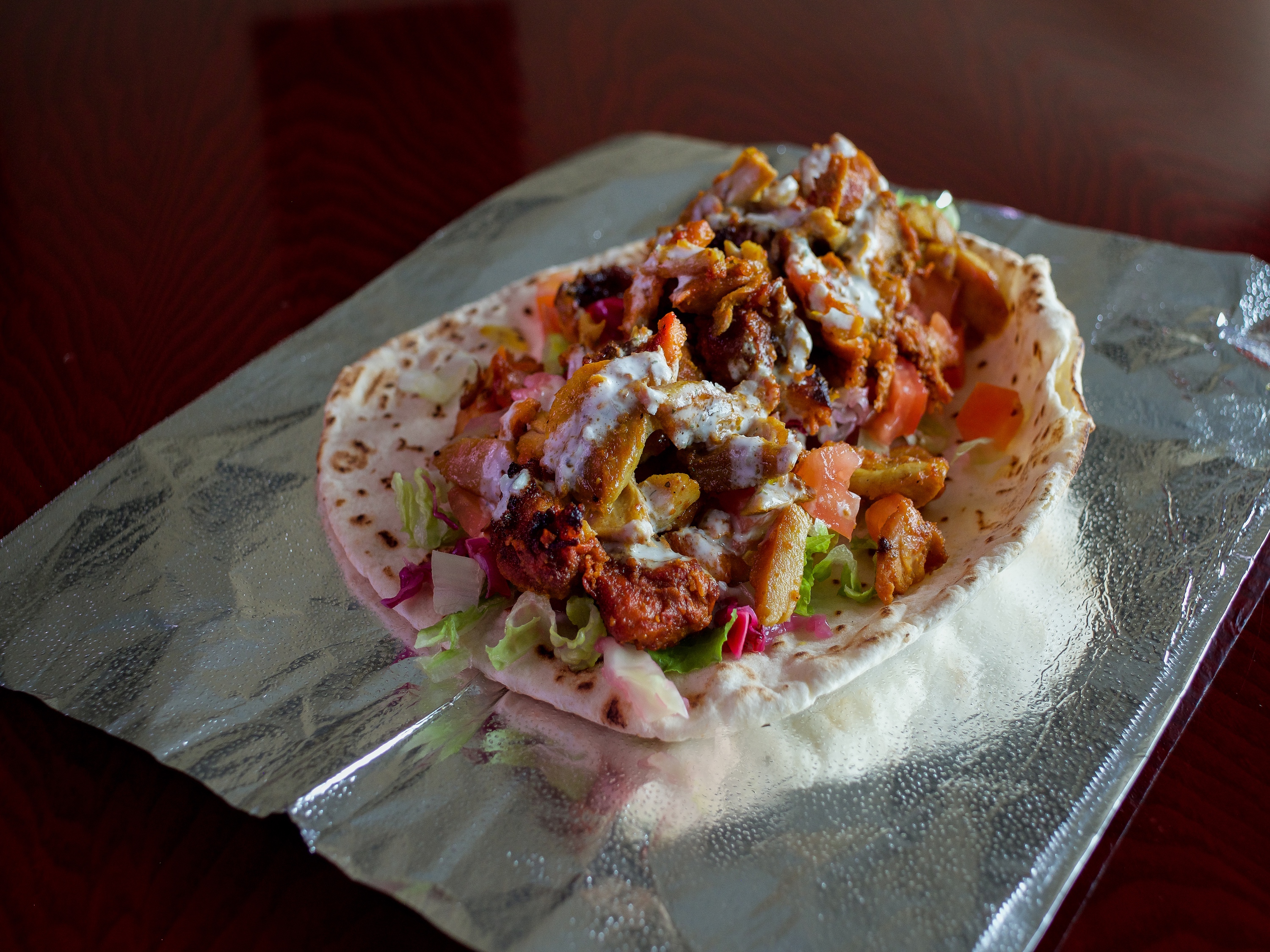 Order 9. Chicken Gyros Wrap food online from Sams Kebab & Gyros store, Concord on bringmethat.com
