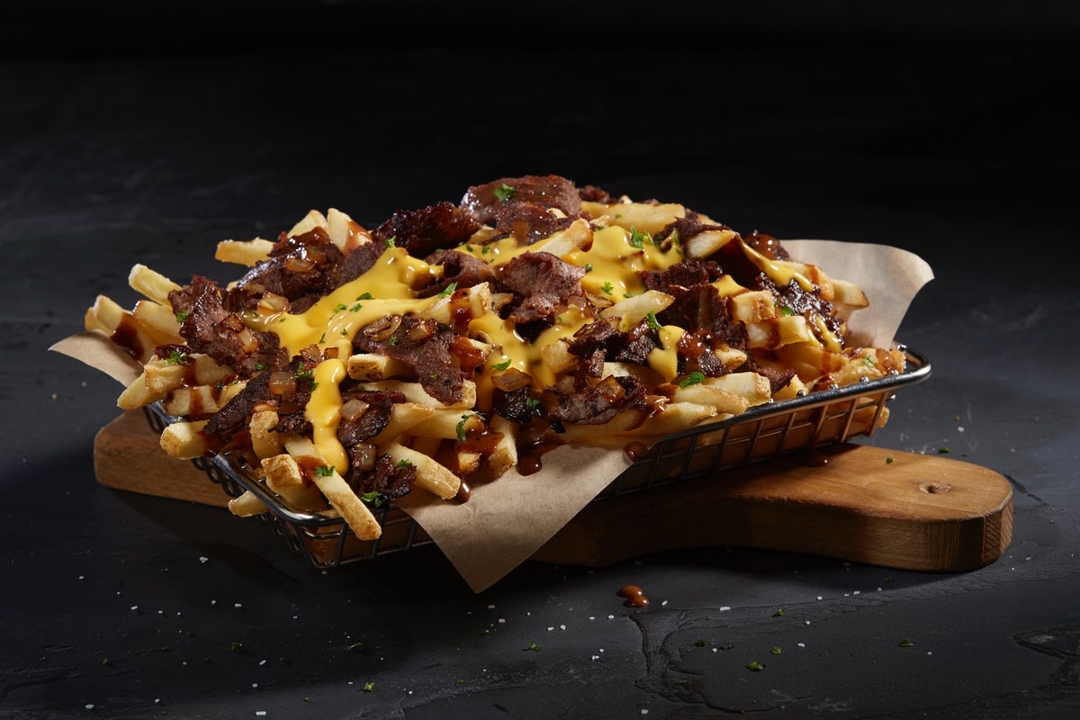 Order NY Cheesesteak Fries food online from Nathan Famous store, Yonkers on bringmethat.com