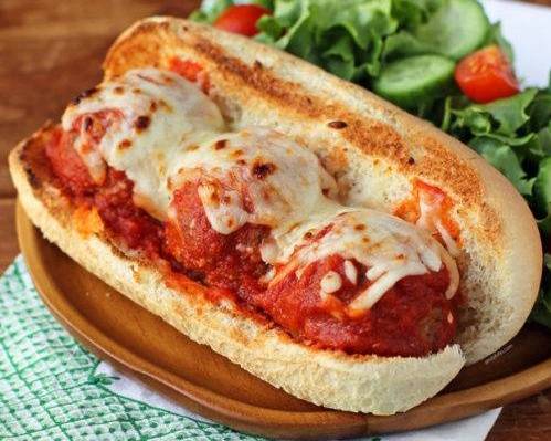 Order Meatball Parmesan Sub food online from Michaelangelo's Pizza store, Baltimore on bringmethat.com