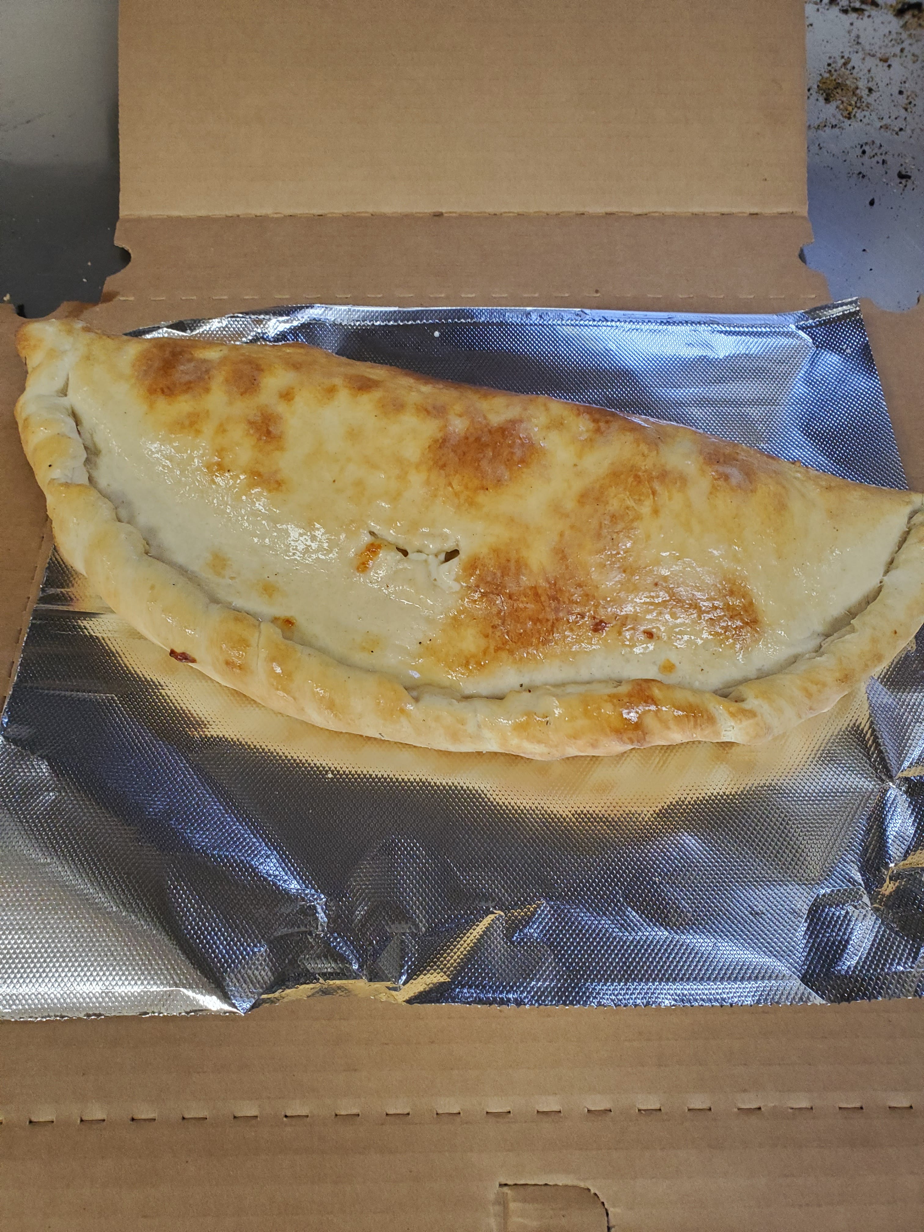 Order Classic Cheese Calzone - Calzone food online from Pizza Cucina store, Oswego on bringmethat.com