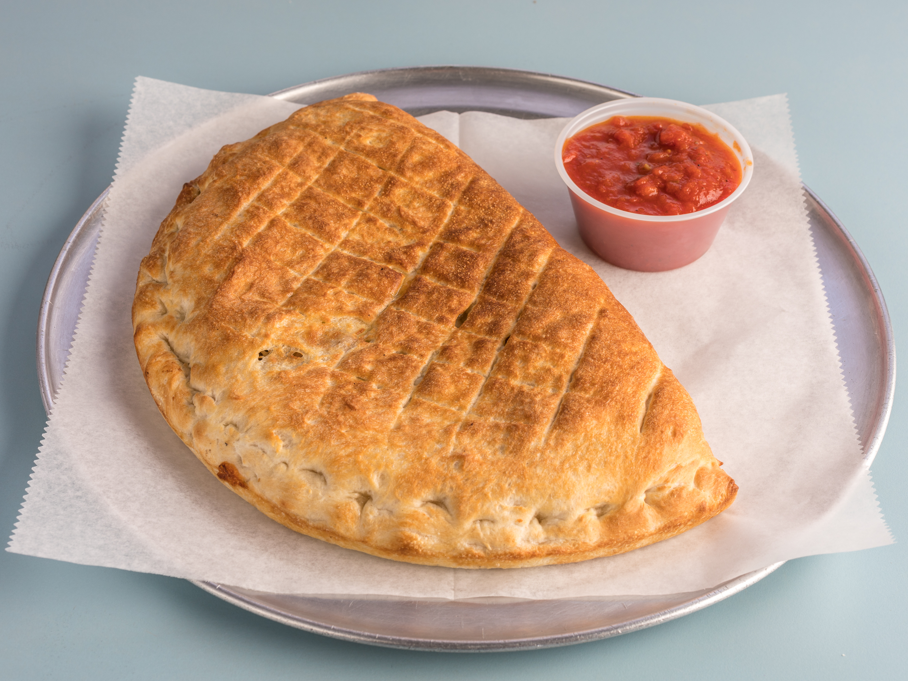 Order Pizza Calzone food online from New England Pizza store, Whitinsville on bringmethat.com