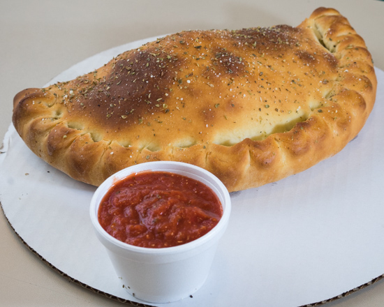 Order Calzone food online from Waldo Cooney's Pizza store, Worth on bringmethat.com