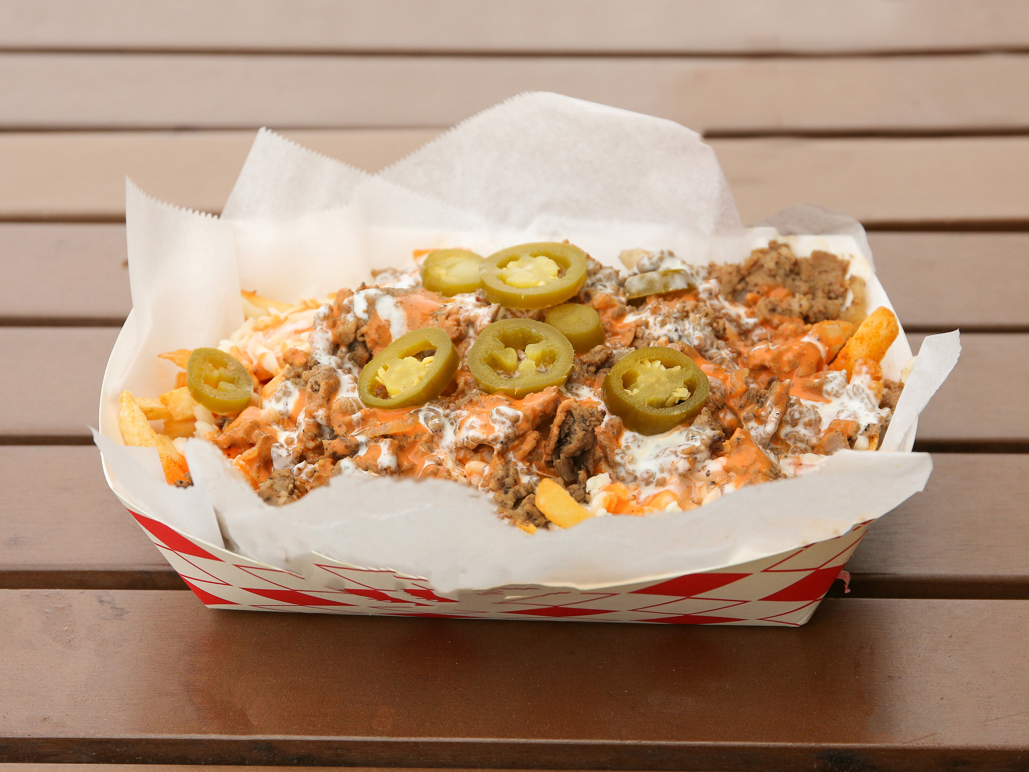 Order Loaded Asada Fries food online from Philly Specials store, San Jose on bringmethat.com