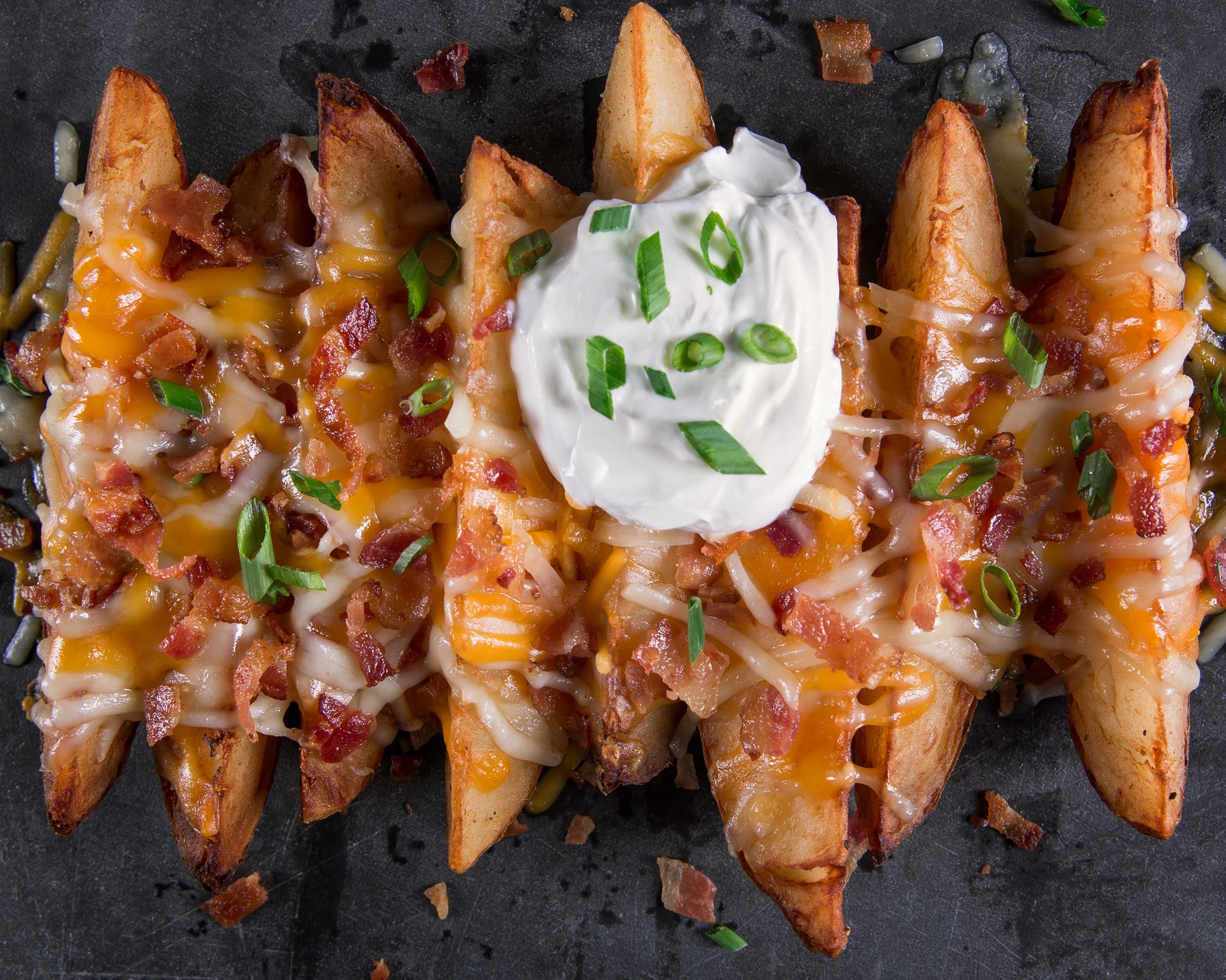 Order Peel-Out Potato Skins food online from Quaker Steak & Lube store, Sharon on bringmethat.com