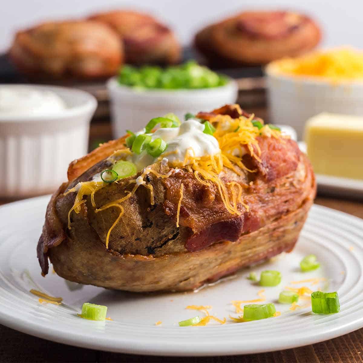 Order Stuffed Baked Potatoes with Chili and Cheddar Cheese food online from Jackson Hole store, Englewood on bringmethat.com