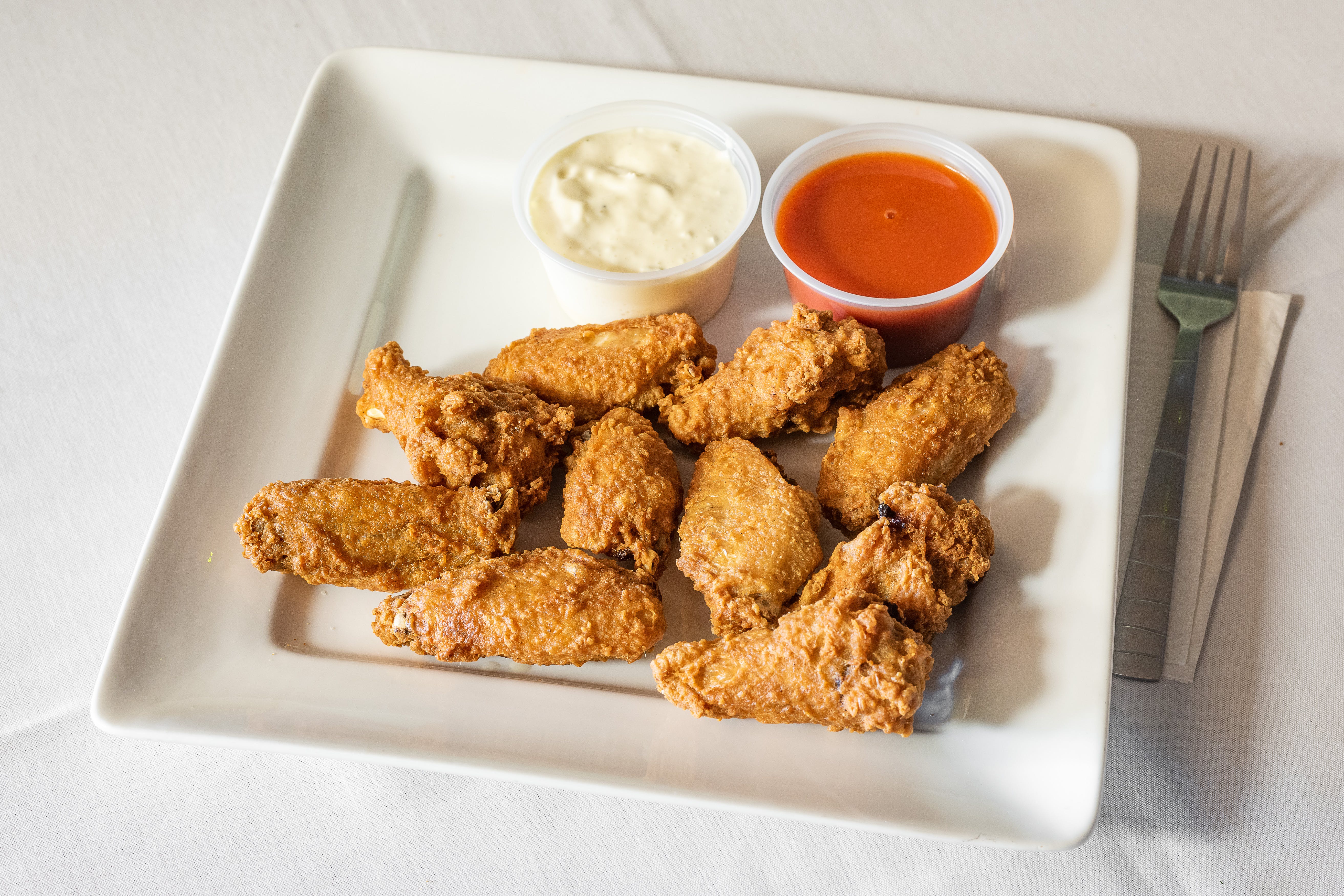 Order Breaded Wings - 8 Pieces food online from Little Italy Pizza store, Forked River on bringmethat.com