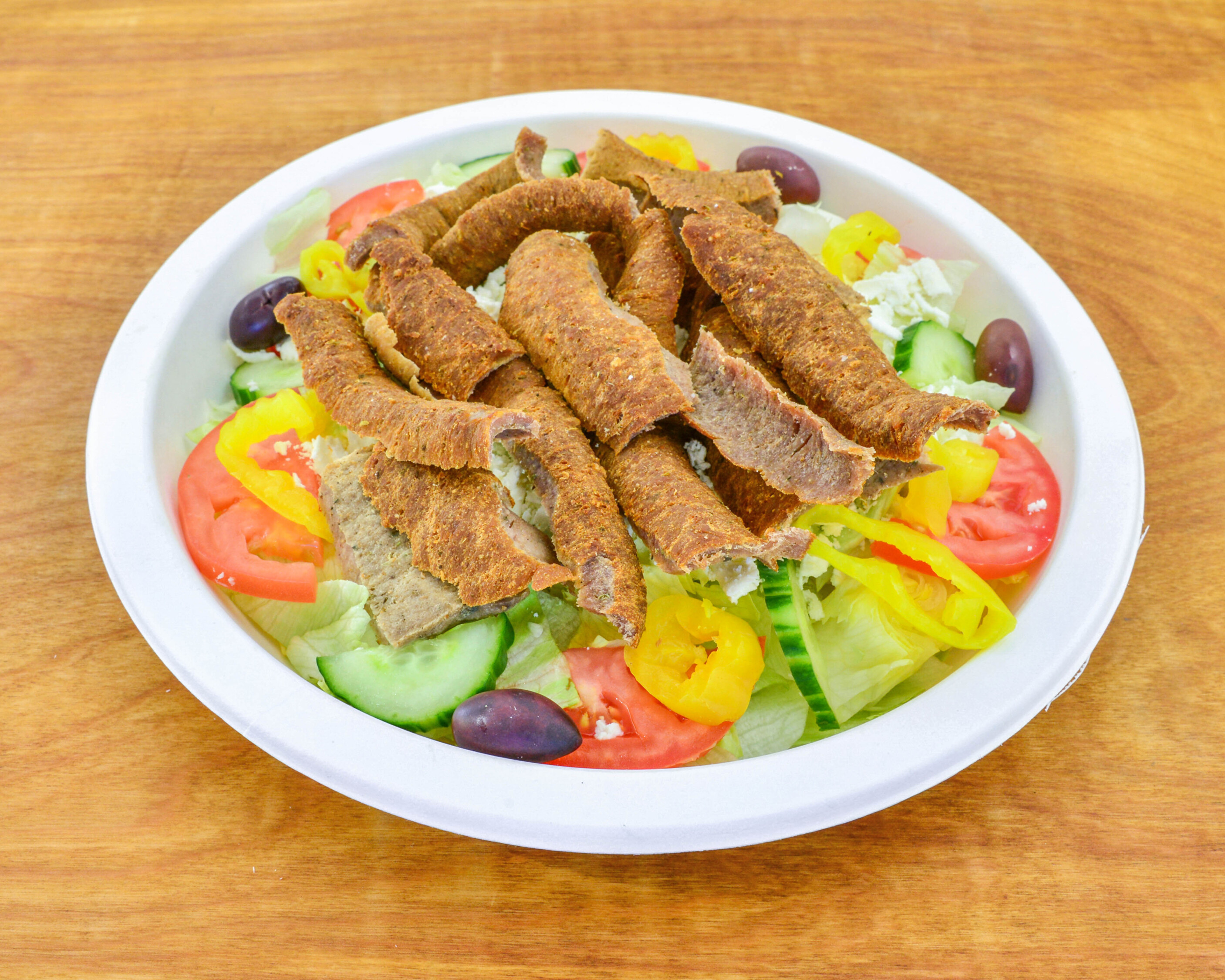 Order Greek Salad food online from Mykonos Gyros store, Columbus on bringmethat.com