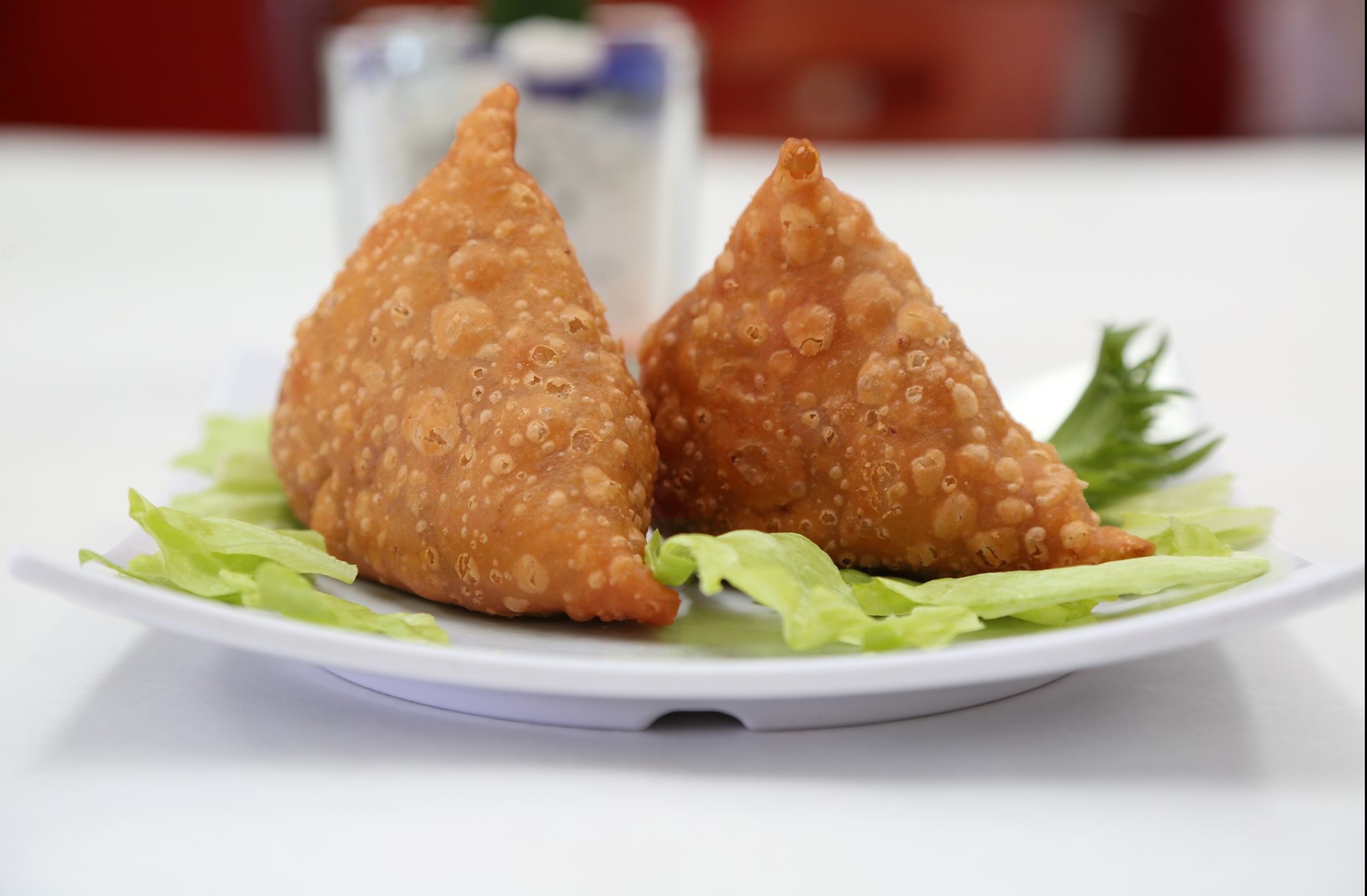 Order 2 Piece Vegetable Samosa without soup food online from Bhojan Ghar store, Harrisburg on bringmethat.com