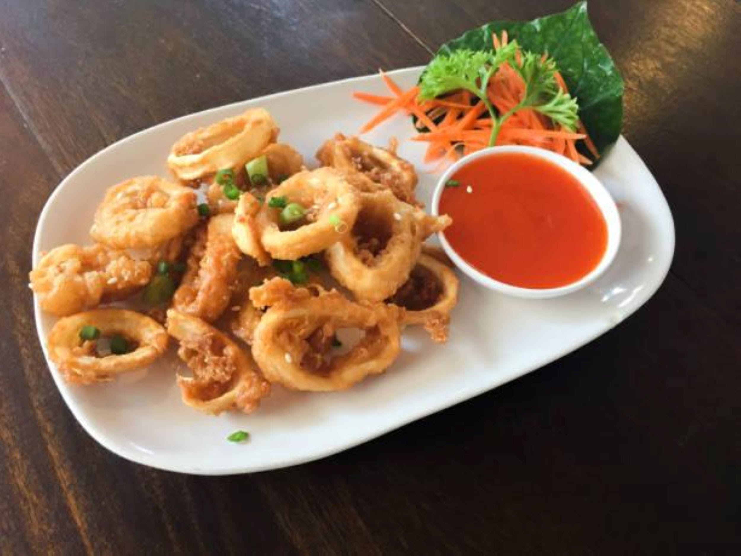 Order Fried Calamari - Appetizer food online from Broadway Pizza & Catering store, Greenlawn on bringmethat.com