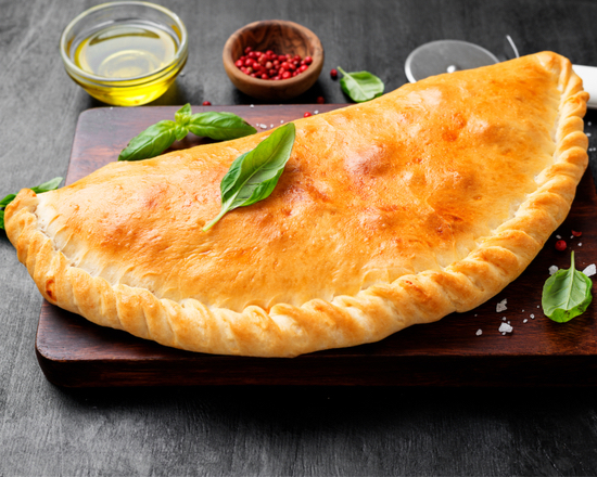 Order The Veggie Calzone food online from Wingman Co. store, Modesto on bringmethat.com