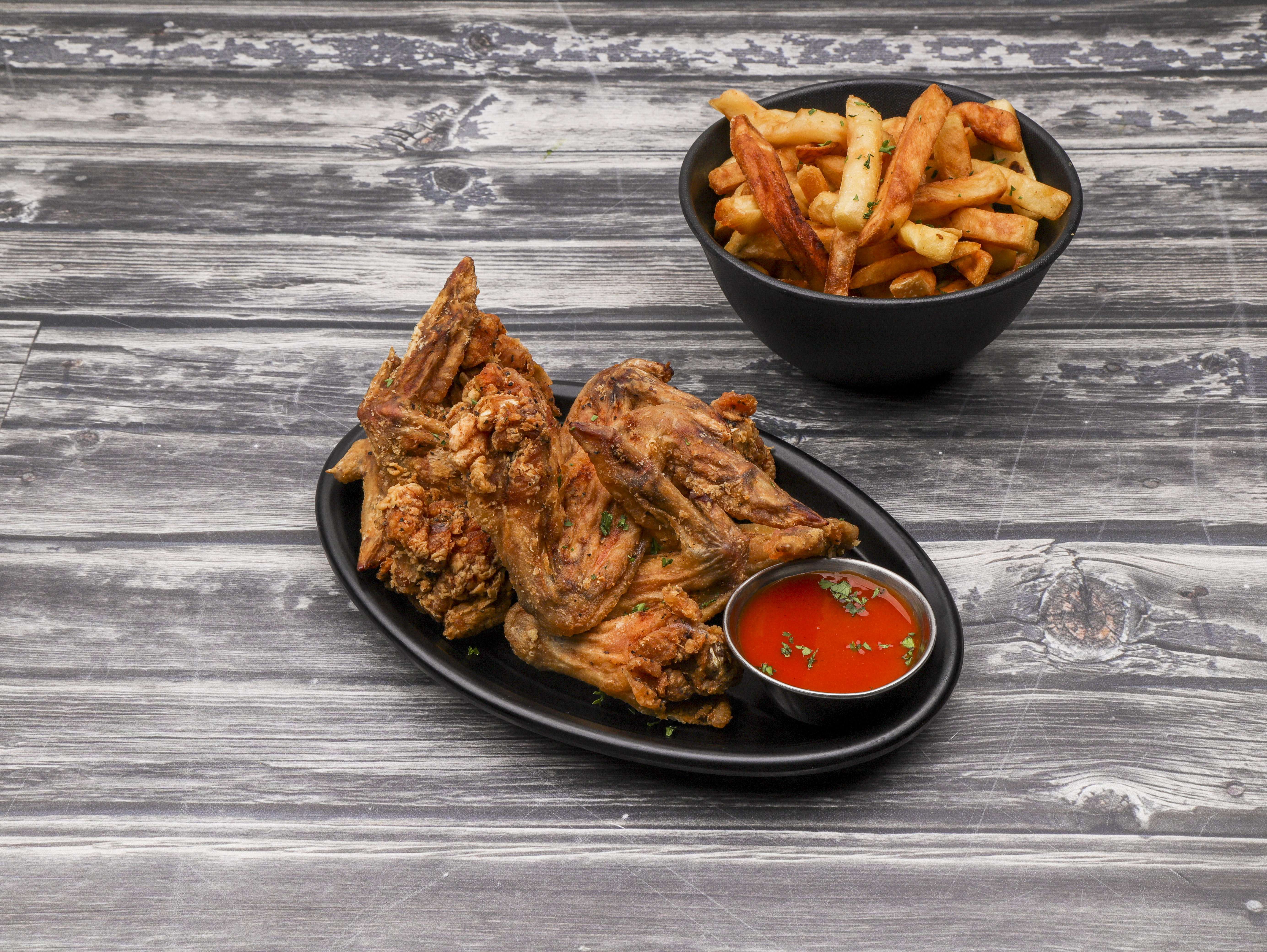 Order 8 Wings and Fries food online from Dutchtown Market store, Saint Louis on bringmethat.com
