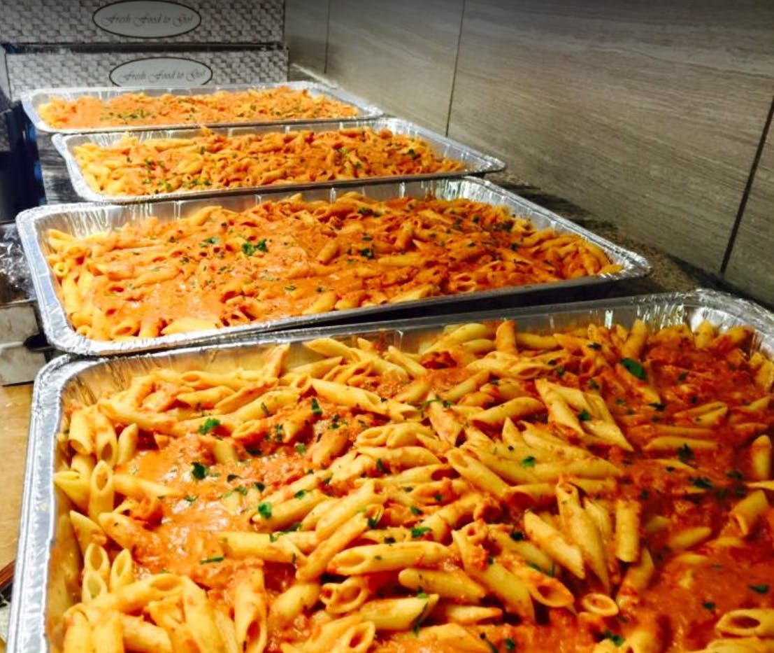 Order Penne Alla Vodka Catering - Half Tray (Serves 5-6 People) food online from Port Jeff Pizza store, Port Jefferson on bringmethat.com