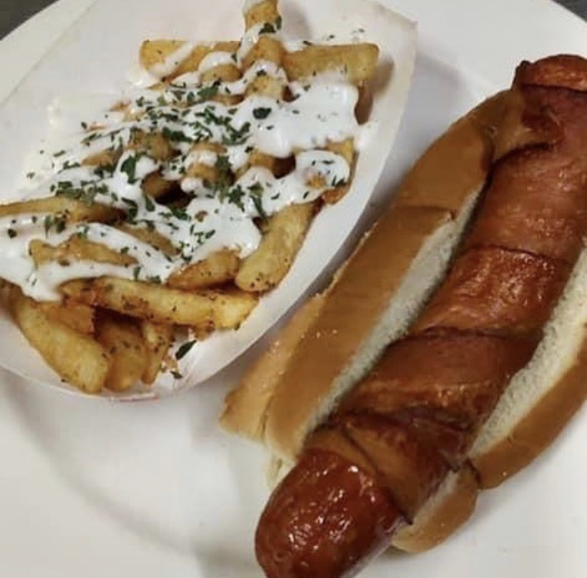 Order Ripper Dog with Wrapped with Bacon food online from Ryan Pub store, Groton on bringmethat.com