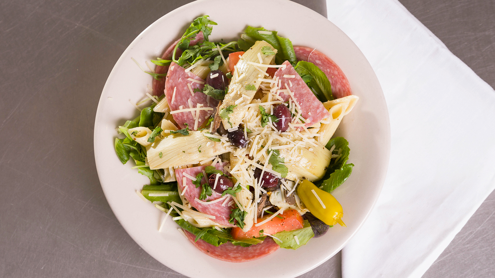 Order Antipasto Salad food online from Romes Pizza store, Helotes on bringmethat.com