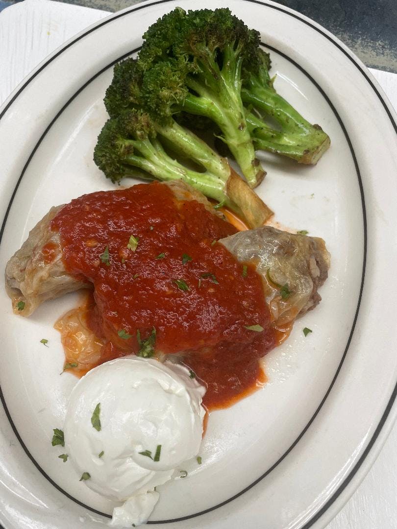 Order Stuffed Cabbage - Entree food online from Pan Am Restaurant store, Fairfax on bringmethat.com