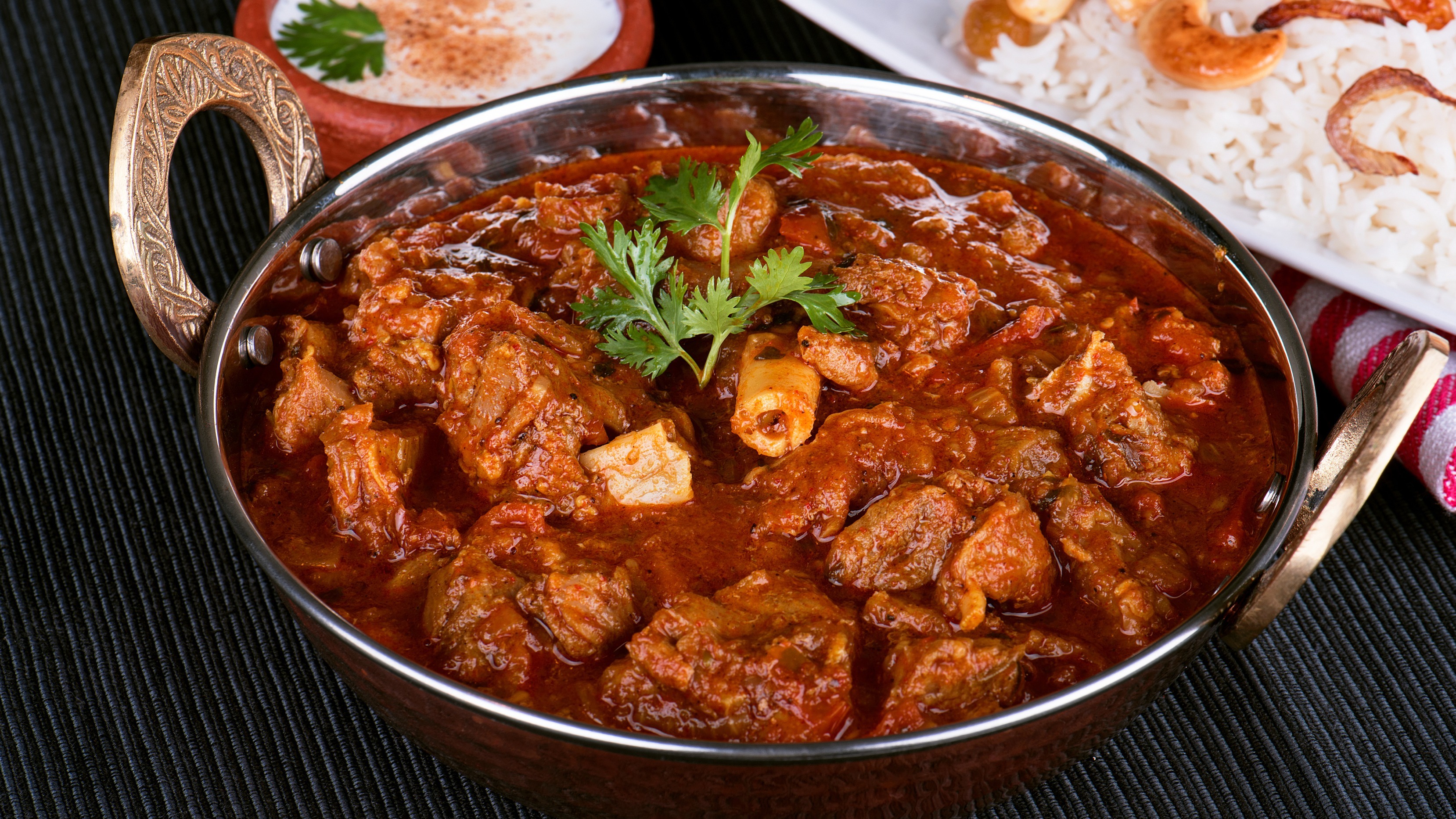 Order Traditional Goat Curry food online from Fire Biryani store, San Francisco on bringmethat.com