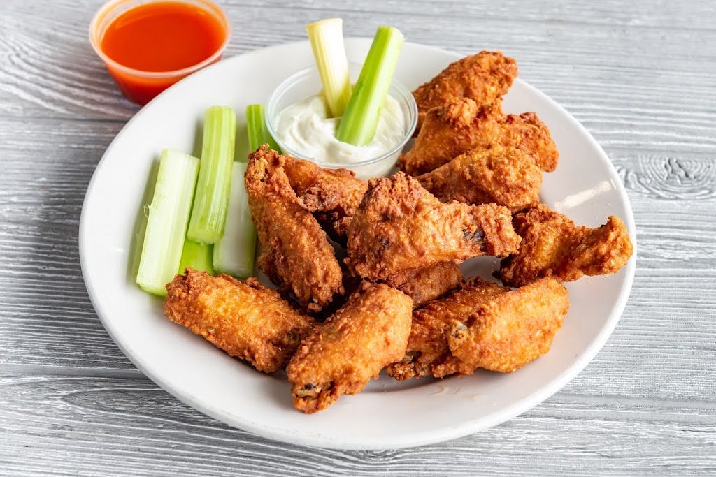 Order Jumbo Buffalo Wings - 10 Pieces food online from Pronto Pizza store, Merchantville on bringmethat.com