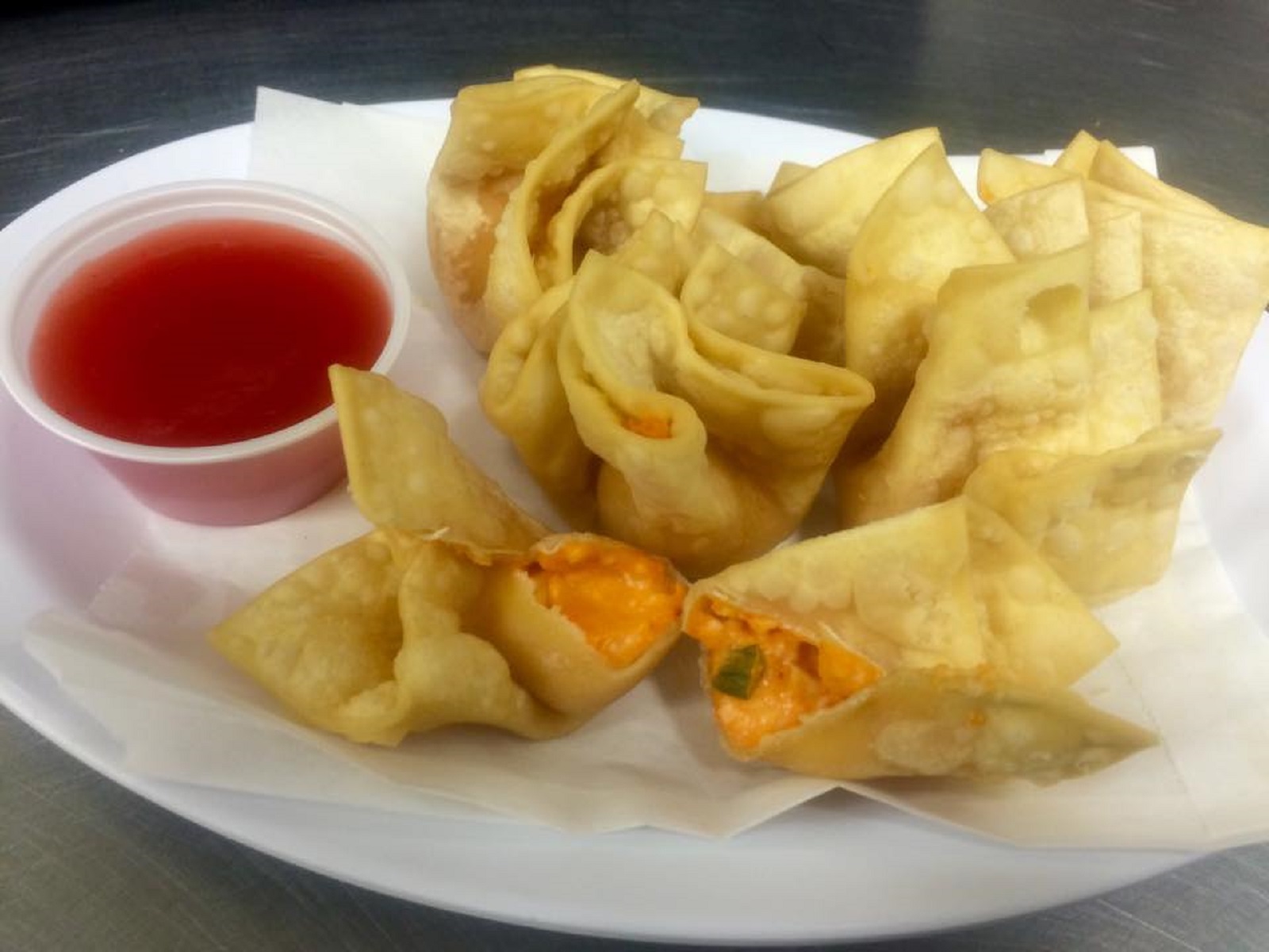 Order 6 Pieces Crab Rangoons  food online from Bamboo store, Webb City on bringmethat.com