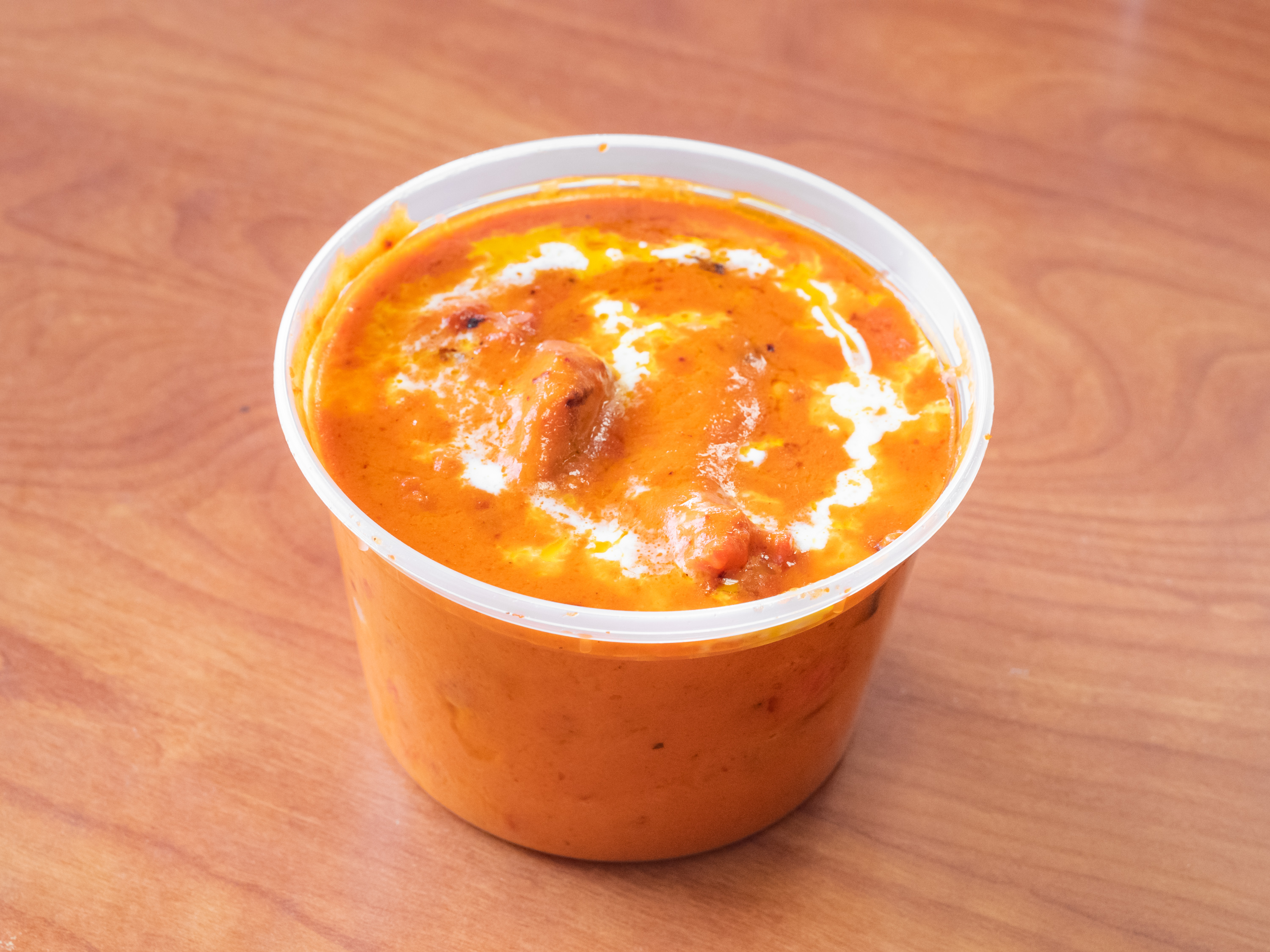 Order 13. Tomato Soup food online from Madina Indian Restaurant store, St. Clair Shores on bringmethat.com