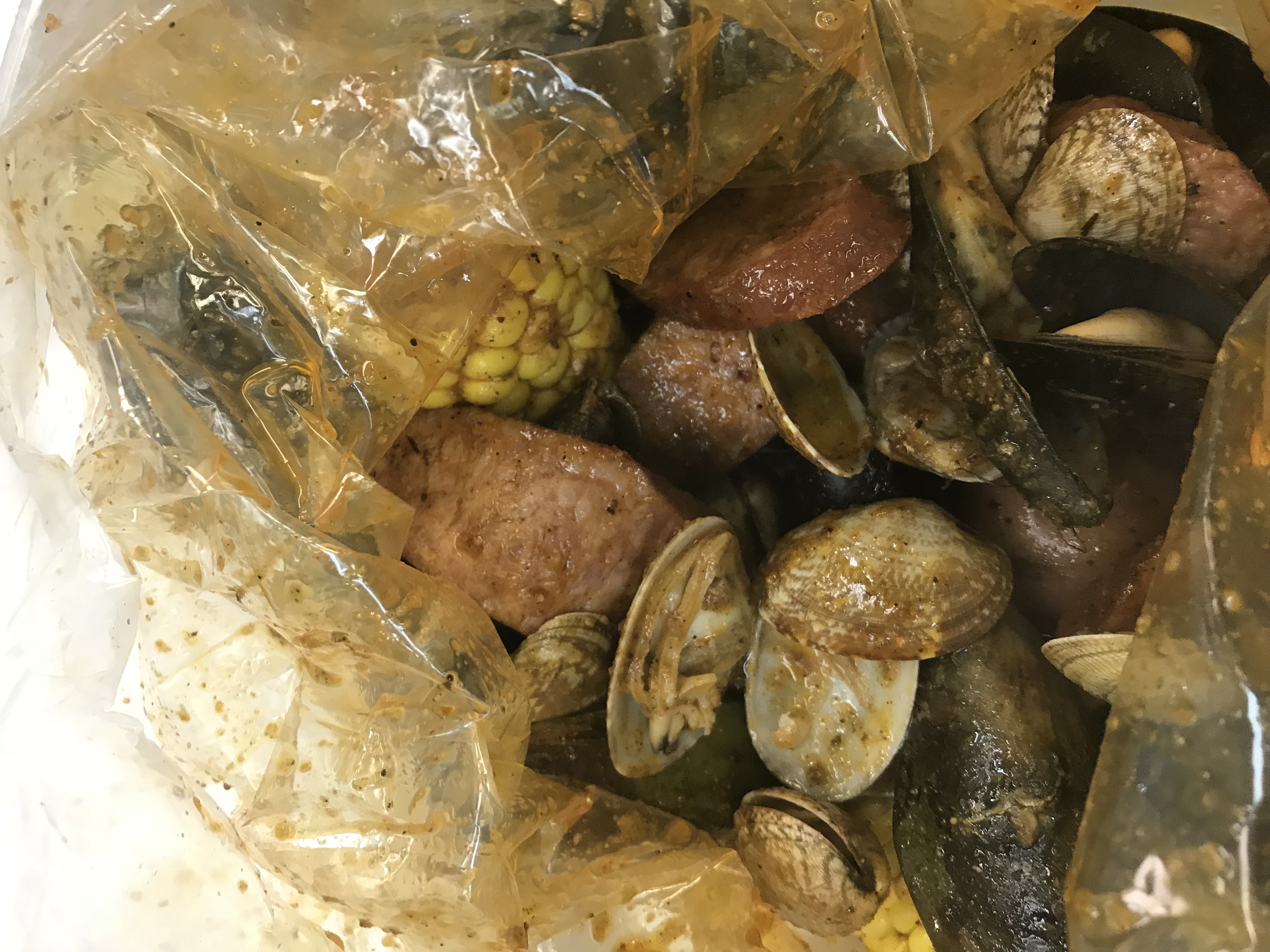 Order G. 1/2 lb. Clam, 1/2 lb. Green Mussels and 1/2 lb. Black Mussels Combo food online from Tasty Crab store, Fayetteville on bringmethat.com