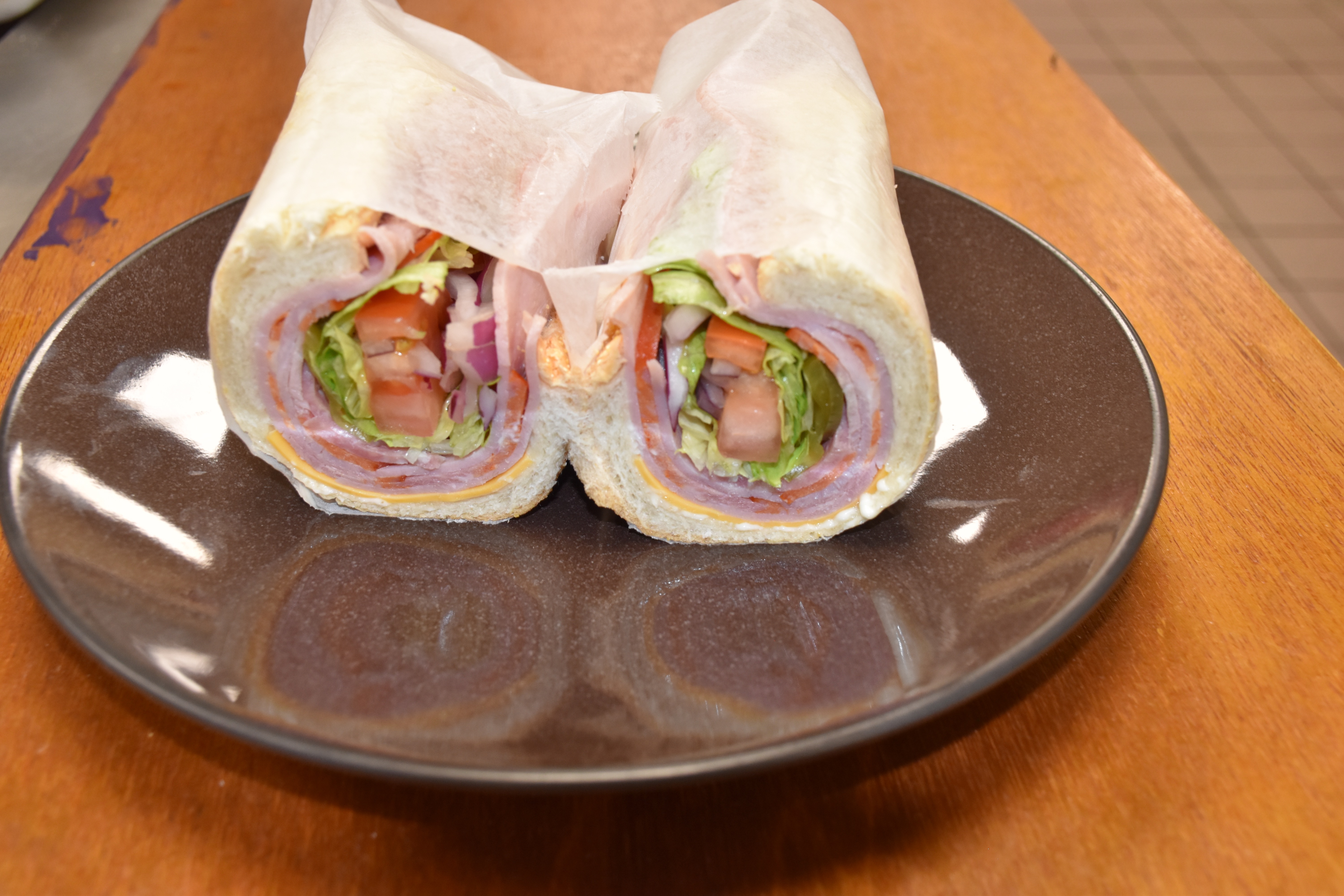Order American Cold Cut Sub food online from Pizzaman Restaurant store, Columbia on bringmethat.com